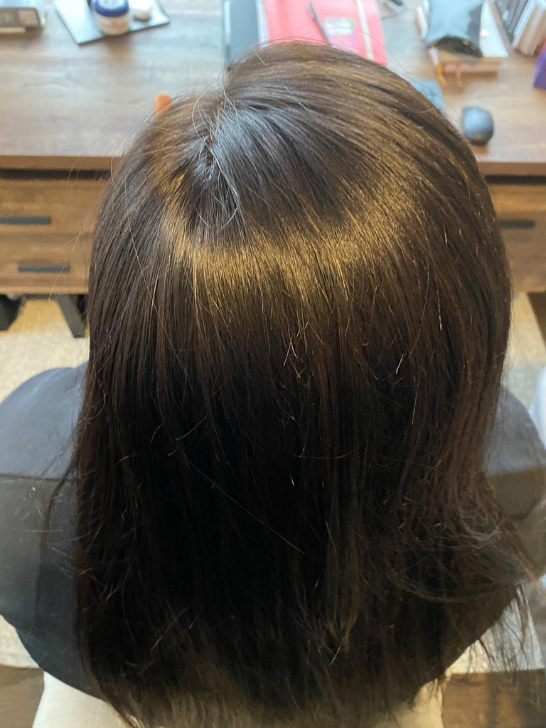 female with topper to cover hair loss